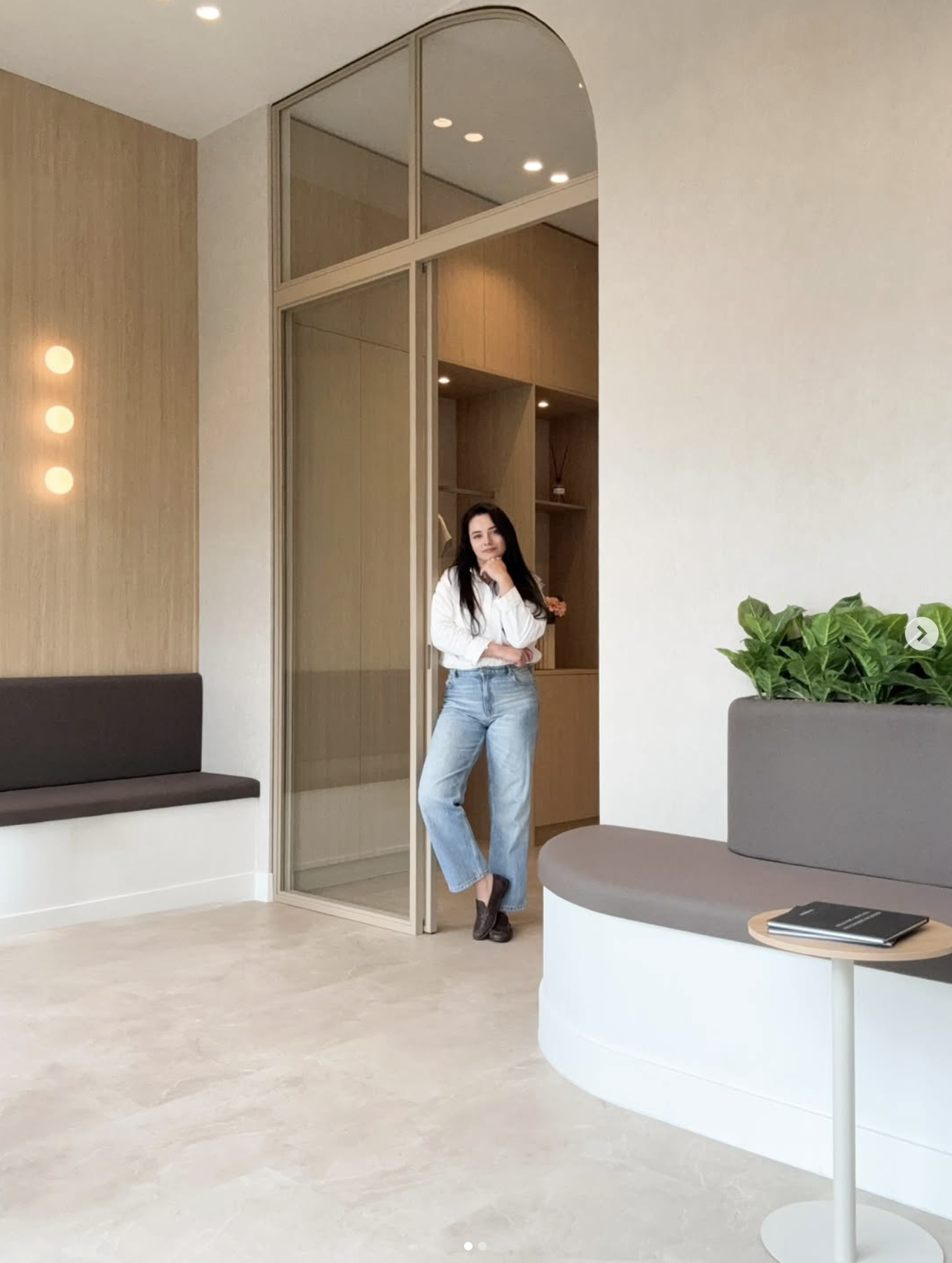 Bright reception with tall arched glass door